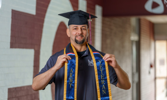 Manhattan Tech graduate wearing his military veteran stole